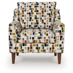 Multicolor patterned accent chair with square upholstery, padded seat, wood legs.