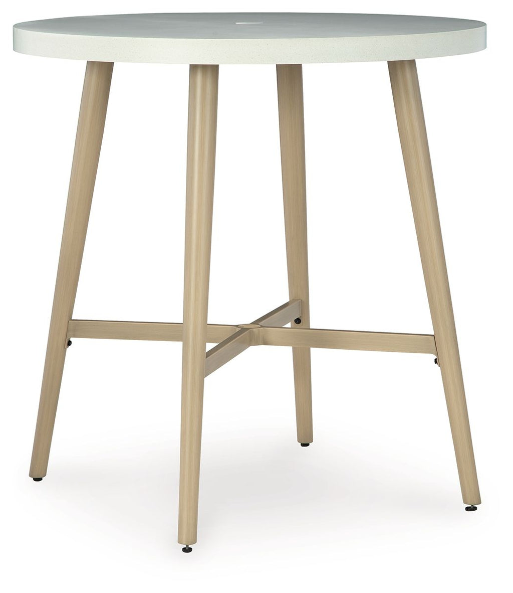 Beige round bar table with cross-brace support, four tapered legs