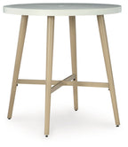 Beige round bar table with cross-brace support, four tapered legs