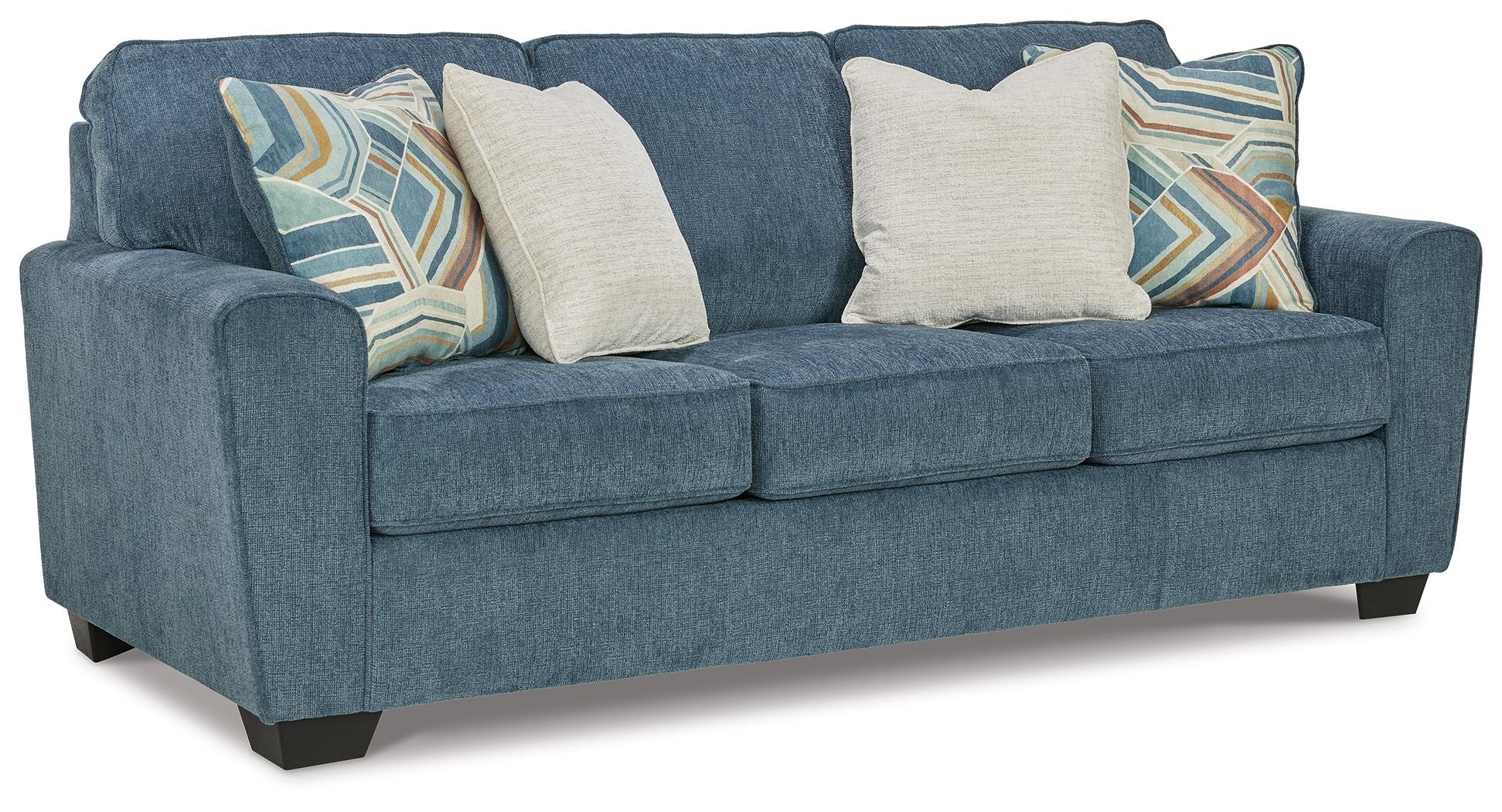 Blue fabric sofa with three seat cushions and decorative throw pillows