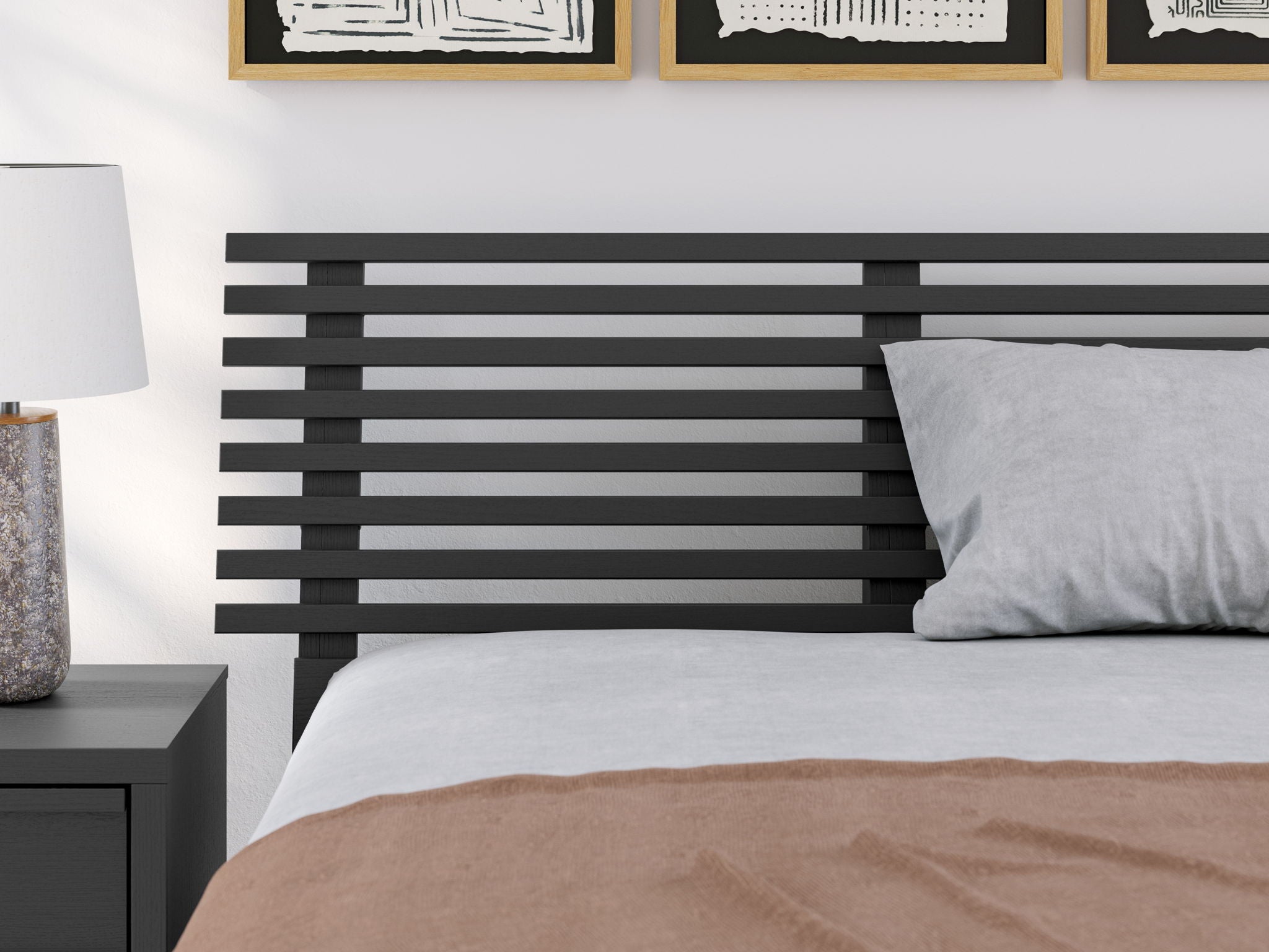 Black full slat headboard behind bed with horizontal slats