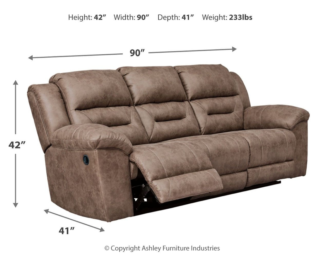 Fossil gray reclining sofa with chaise footrest; size measurement text shown
