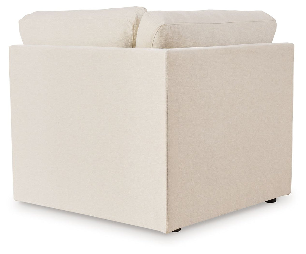 Upholstered wedge sectional chair in light beige with squared arm and side panel