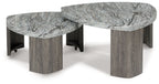 Stacked cocktail table set with two overlapping round stone-look tabletops and gray base legs