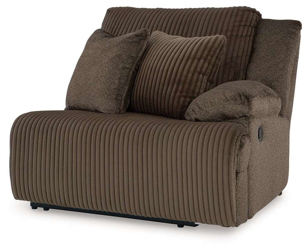 Chocolate-brown fabric zero-wall recliner with ribbed arms and side button detail