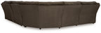 Dark brown reclining sectional sofa base with padded arms and skirted sides