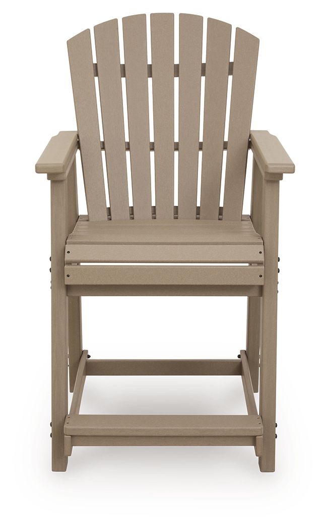 Light brown wooden barstool with slatted back, wide armrests, and front panel.