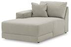 Left-arm facing corner chaise, light gray upholstered with boxy cushions and throw pillows.