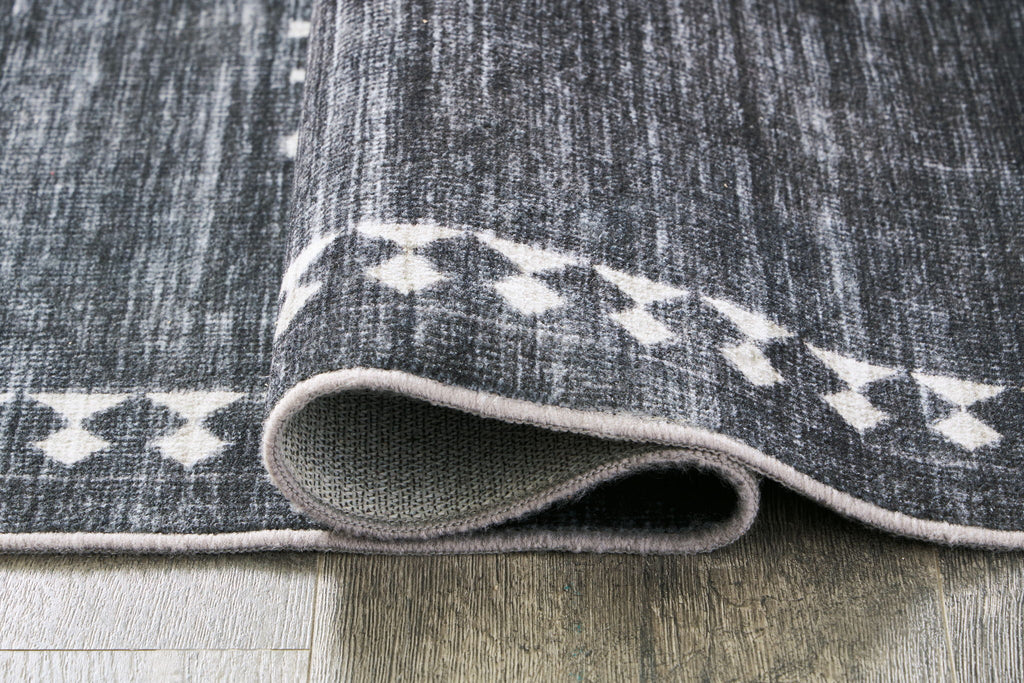 Arloman - 5' x 7' Rug - Black / Cream / Gray