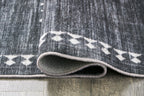 Arloman - 5' x 7' Rug - Black / Cream / Gray