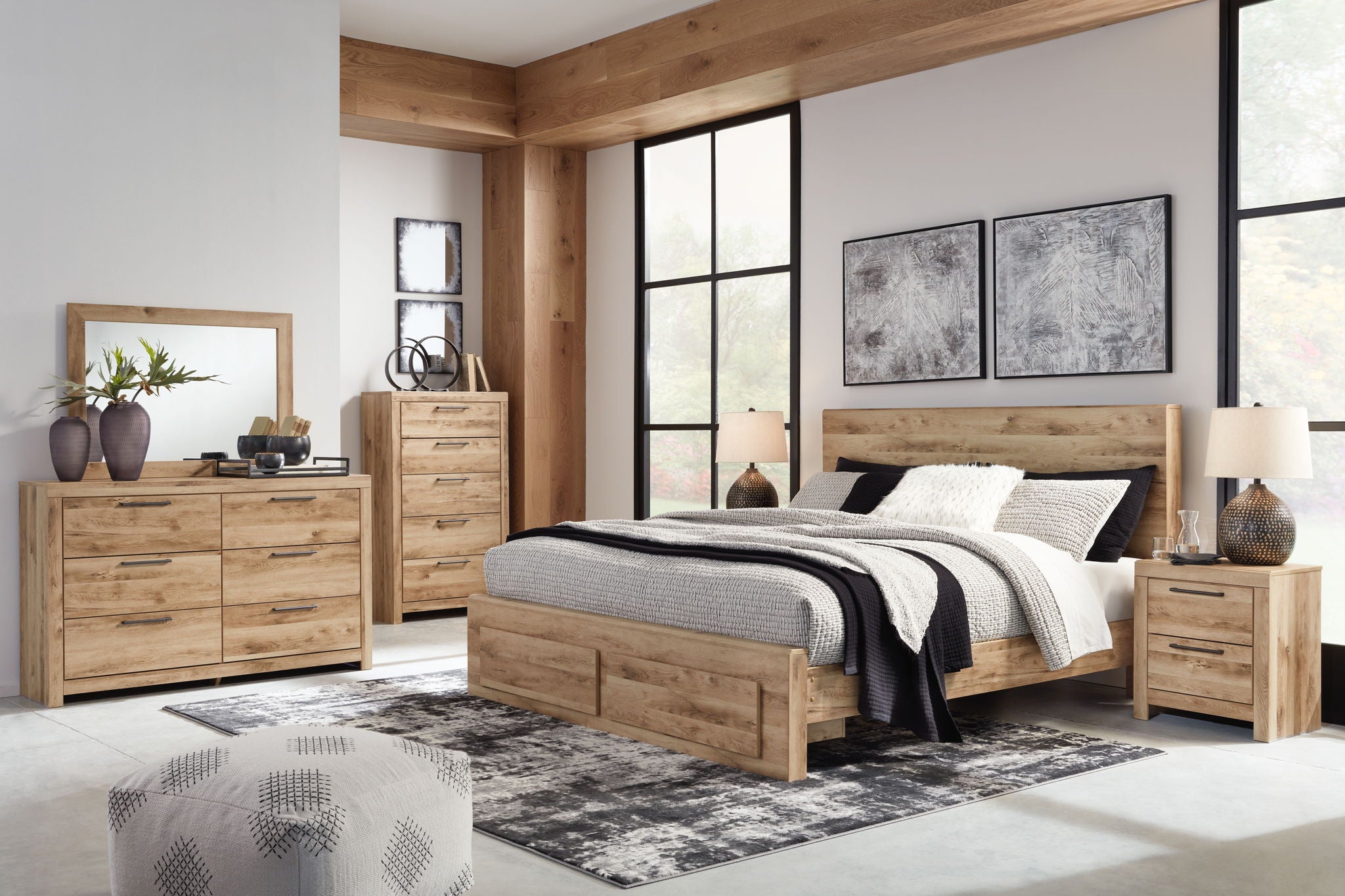 Storage bedroom set with bed, dresser, mirror, and two side tables