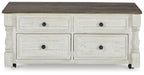 Lift-top cocktail table with four drawers, white cabinet and dark wood top