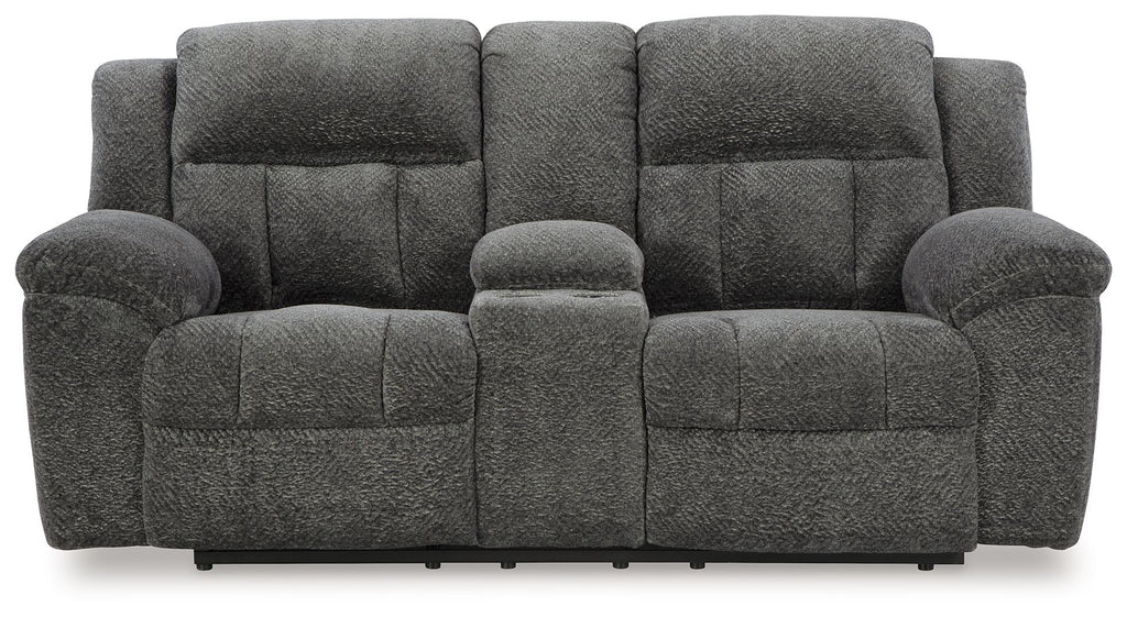 Dark gray double reclining loveseat with central headrest and tufted seat cushions