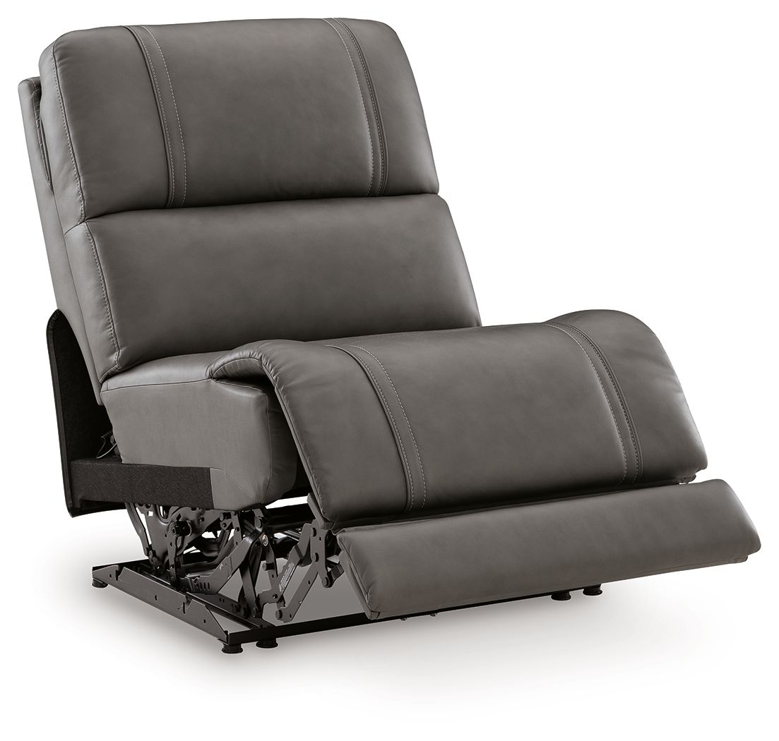 Dark gray power armless recliner with adjustable headrest and visible recline mechanism