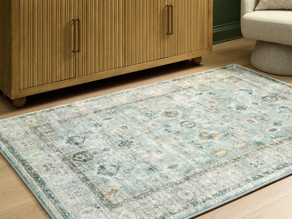 Ladstoney rug with blue and beige vintage look, border and central medallions