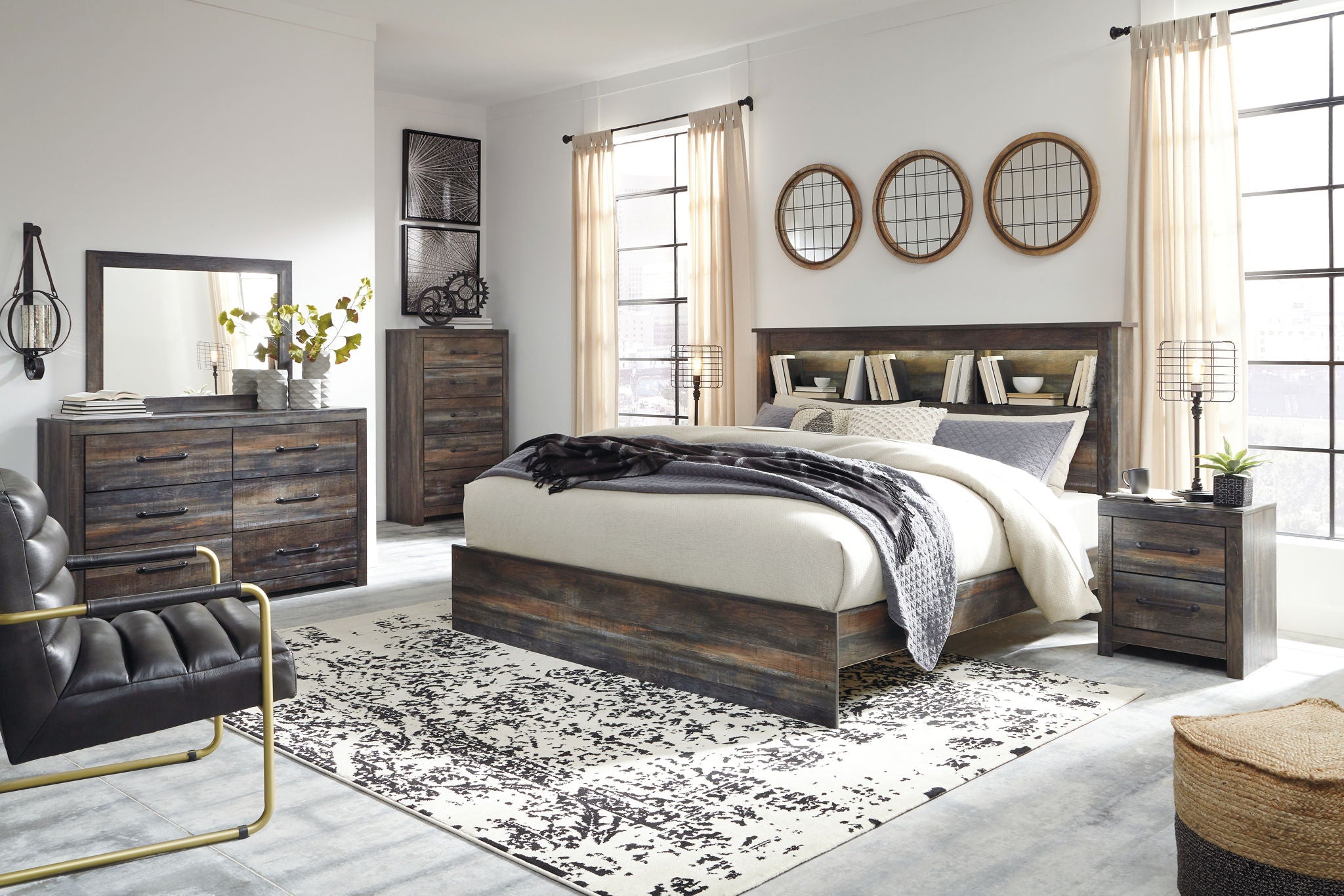 Panel bookcase bed with dark wood frame, white bedding, and side drawer storage