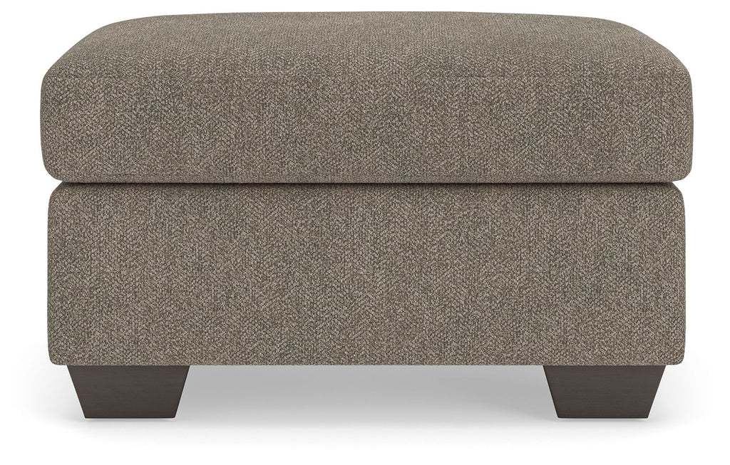 Triston-Peaks upholstered ottoman with rounded top, textured taupe fabric, dark legs