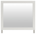 Rectangular white bedroom mirror with wide frame and bottom corner braces