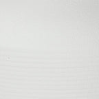 White ceramic vase surface close-up with subtle speckling