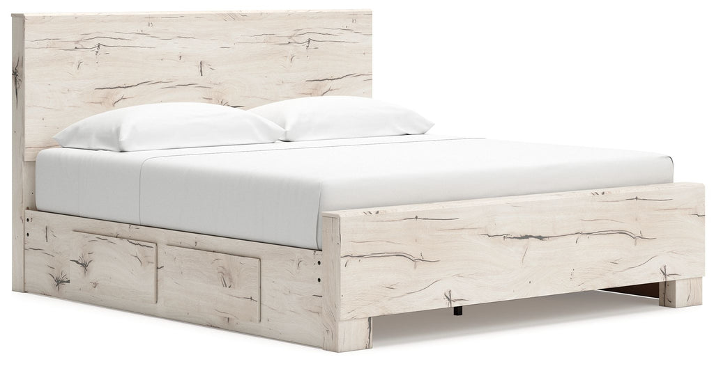 Beige panel bed with front storage drawers and low foot rail in light wood