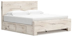 Beige panel bed with front storage drawers and low foot rail in light wood