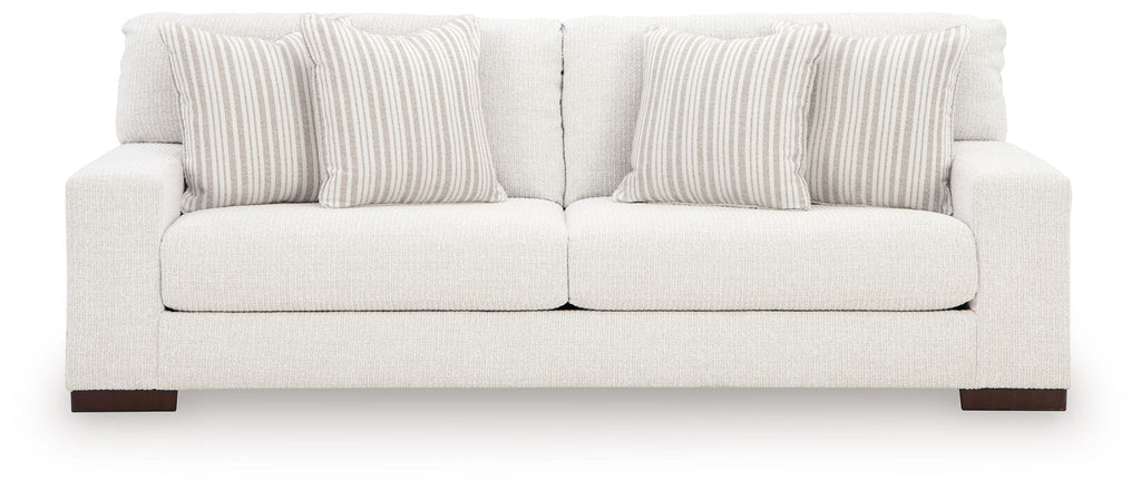 Hartside sofa with off-white upholstery and two-seater cushions, dark wood feet