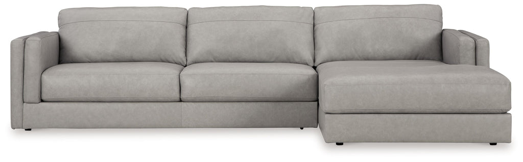 Sectional sofa with chaise lounge, light gray upholstery, wide seat and back cushion blocks
