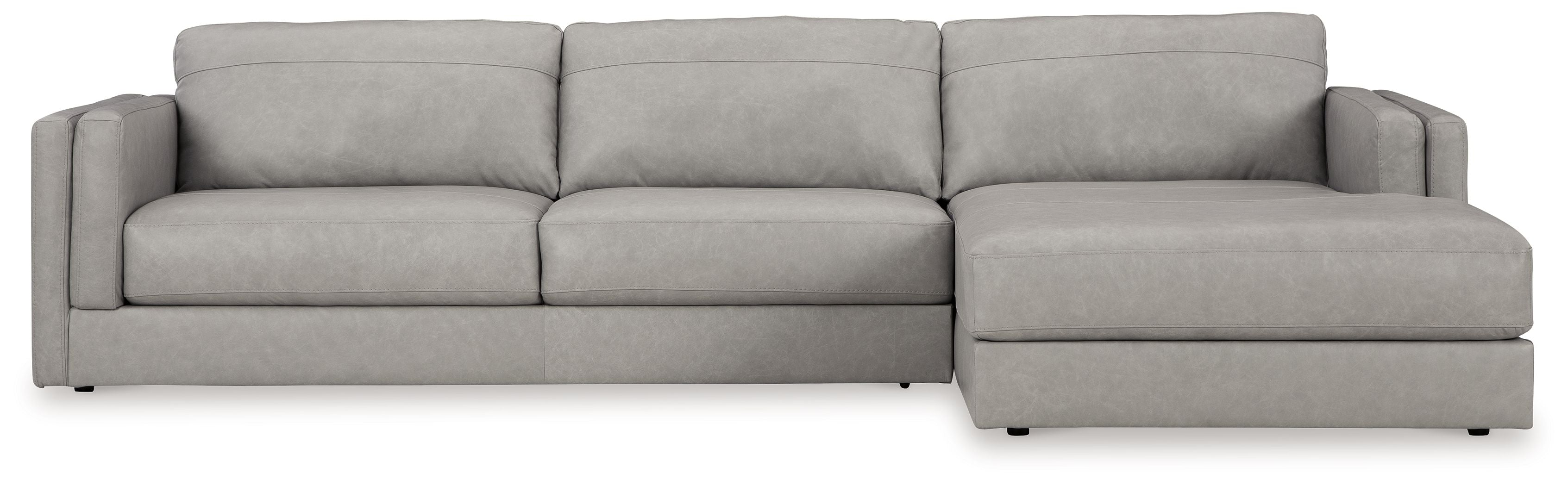 Sectional sofa with chaise lounge, light gray upholstery, wide seat and back cushion blocks