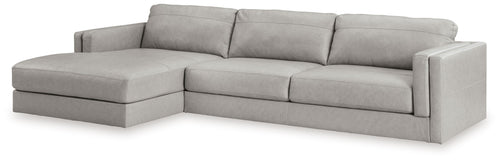 Sectional sofa with chaise lounge, light gray upholstery, tufted seat and back cushions