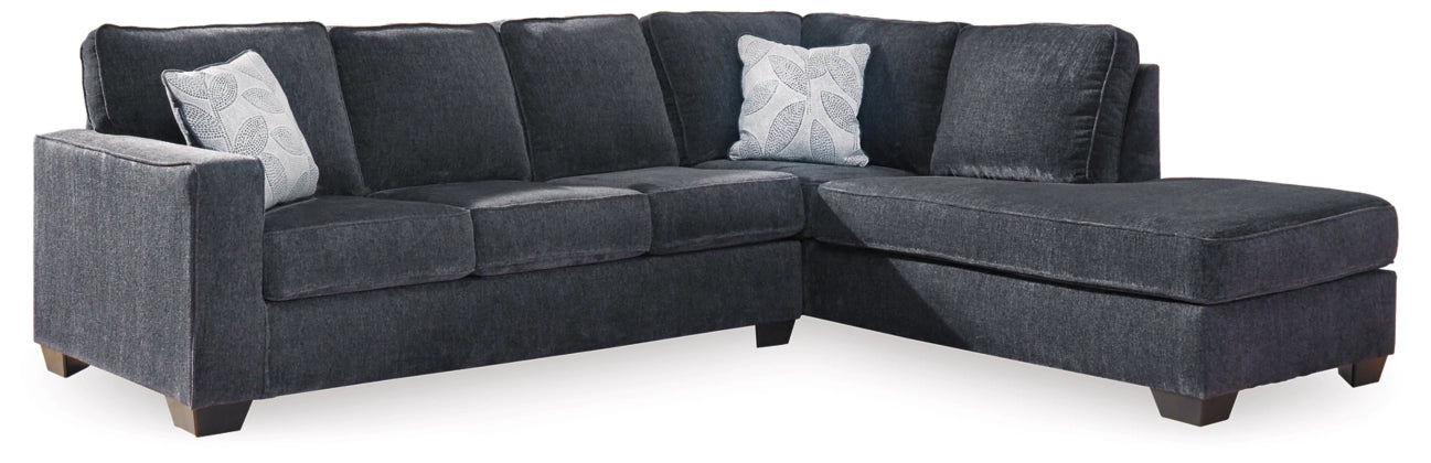Dark gray sectional sofa with chaise, square arms and multiple back pillows