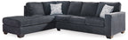 Dark slate fabric sectional sofa with chaise and square throw pillows