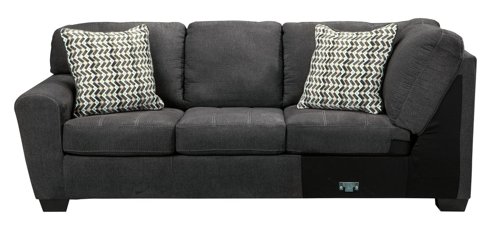 Slate sectional sofa with two patterned square pillows and wide cushioned arms