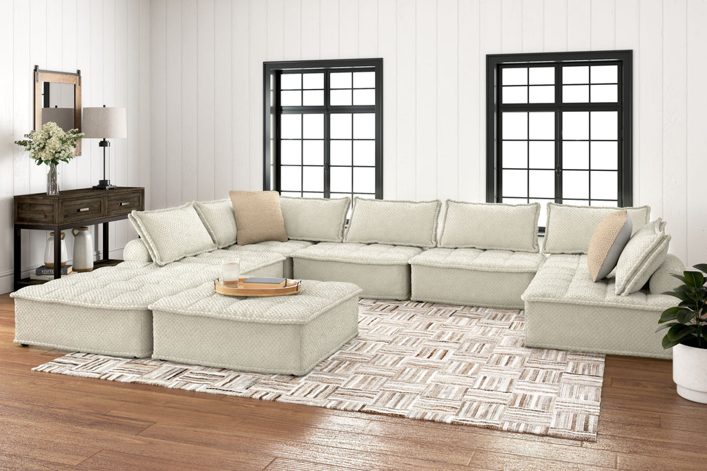 Taupe sectional sofa with chaise corner and coordinated seat and back cushions