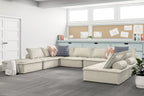 Taupe modular sectional sofa with chaise extensions and multiple back and accent pillows