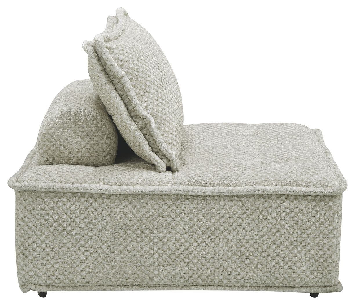 Taupe accent chaise with textured upholstery and tall back pillow, side profile