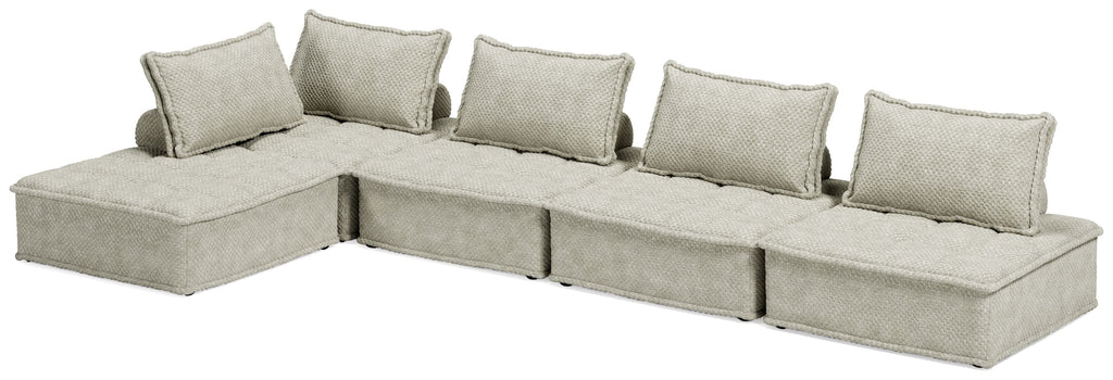 Taupe modular sectional sofa with corner seating and four back cushions