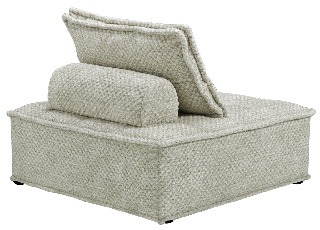 Taupe upholstered chaise lounge with curved arm and back pillow, angled view