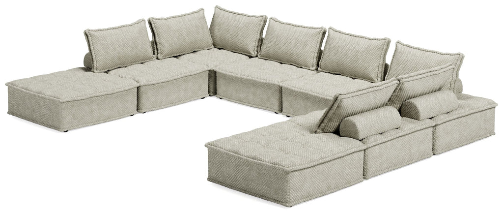 Taupe modular sectional with corner unit and chaise chaise, shown from front angle