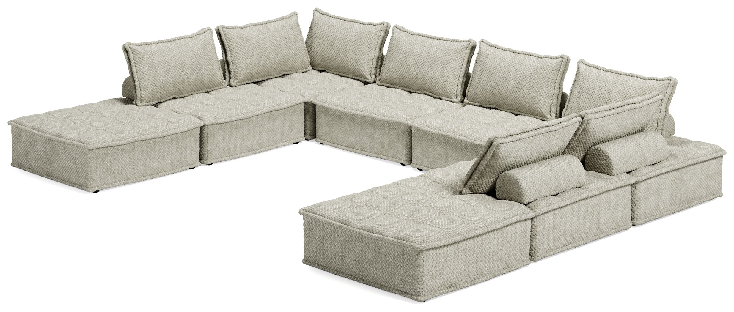 Taupe modular sectional with corner unit and chaise chaise, shown from front angle