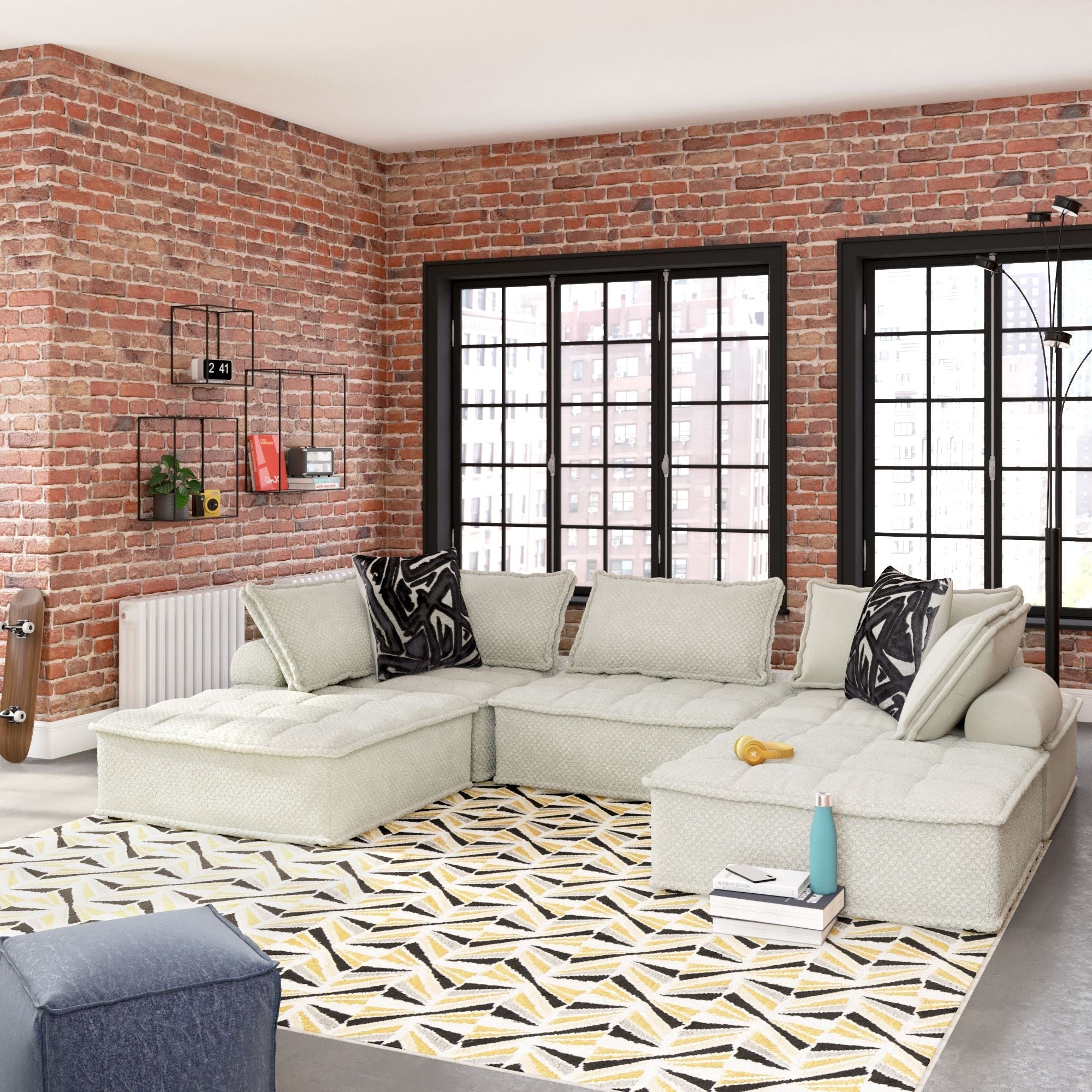 Taupe modular sectional sofa with chaise sections and decorative throw pillows