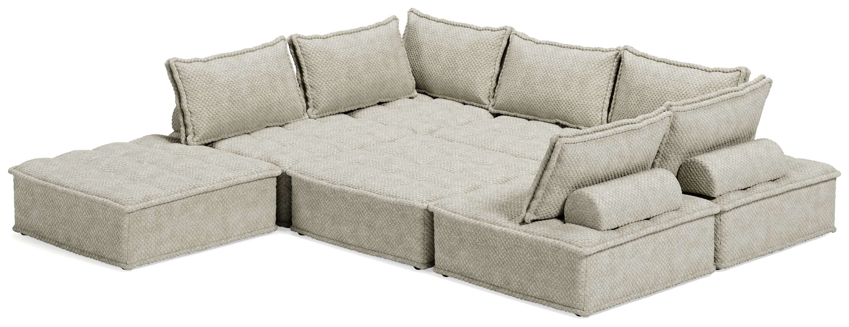 Taupe modular sectional sofa with chaise-style corner and four back cushions