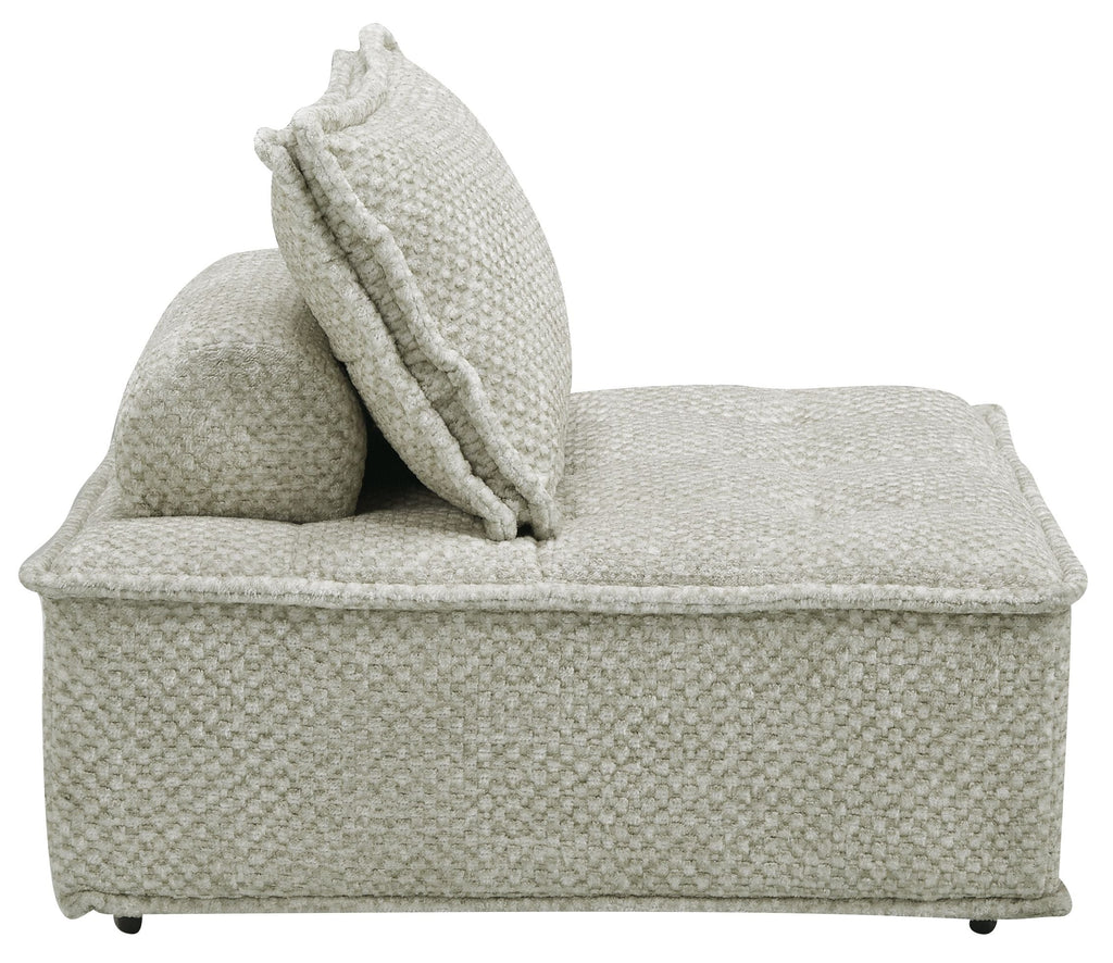 Taupe upholstered sectional chaise with side bolster and textured accent pillow