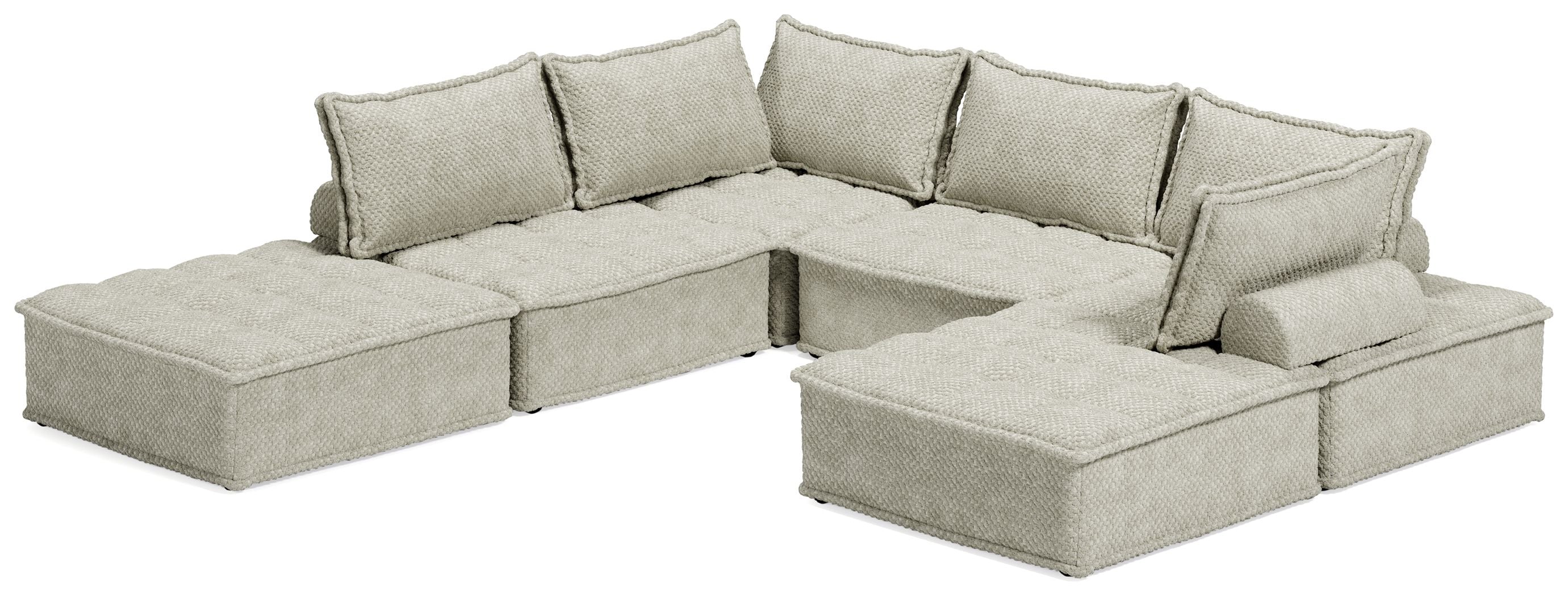 Taupe modular sectional sofa with U-shaped layout and multiple back cushions