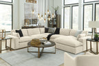 Beige linen sectional sofa with right chaise, decorative throw pillows and deep seat cushions