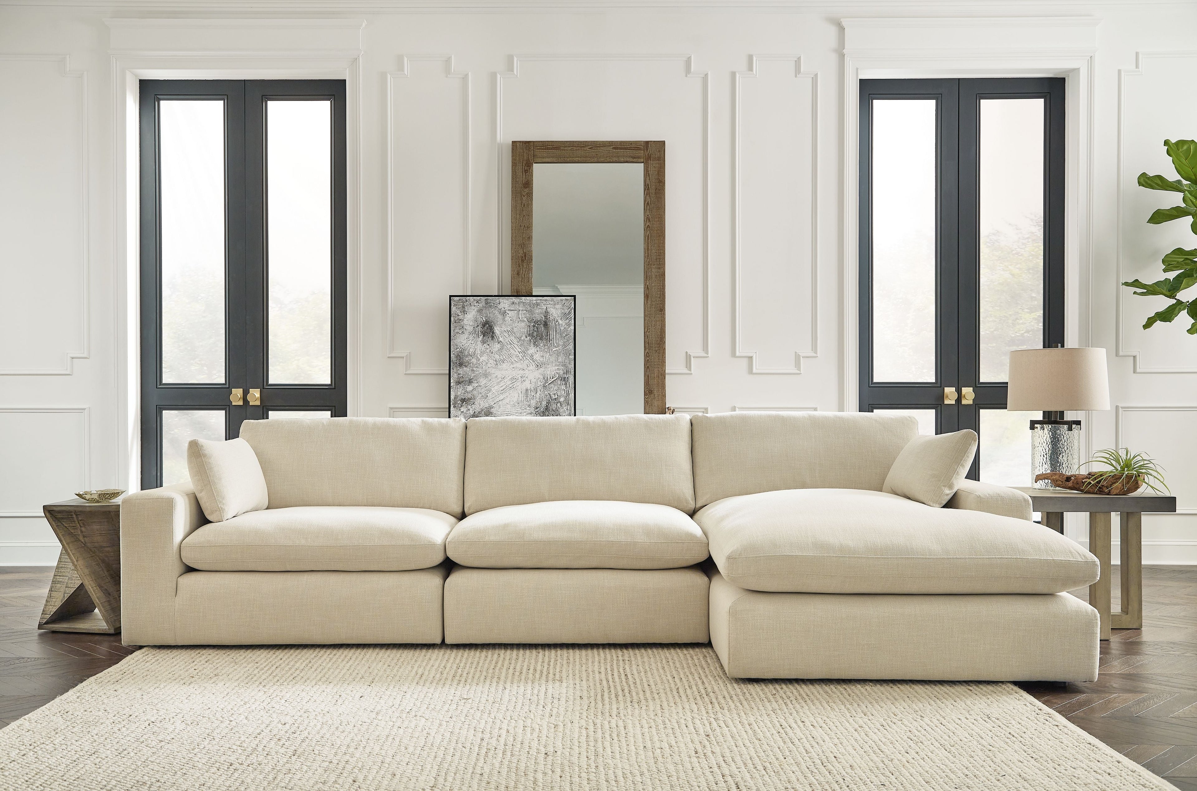 Beige linen sectional sofa with right chaise, tuftless cushions and track-style arms
