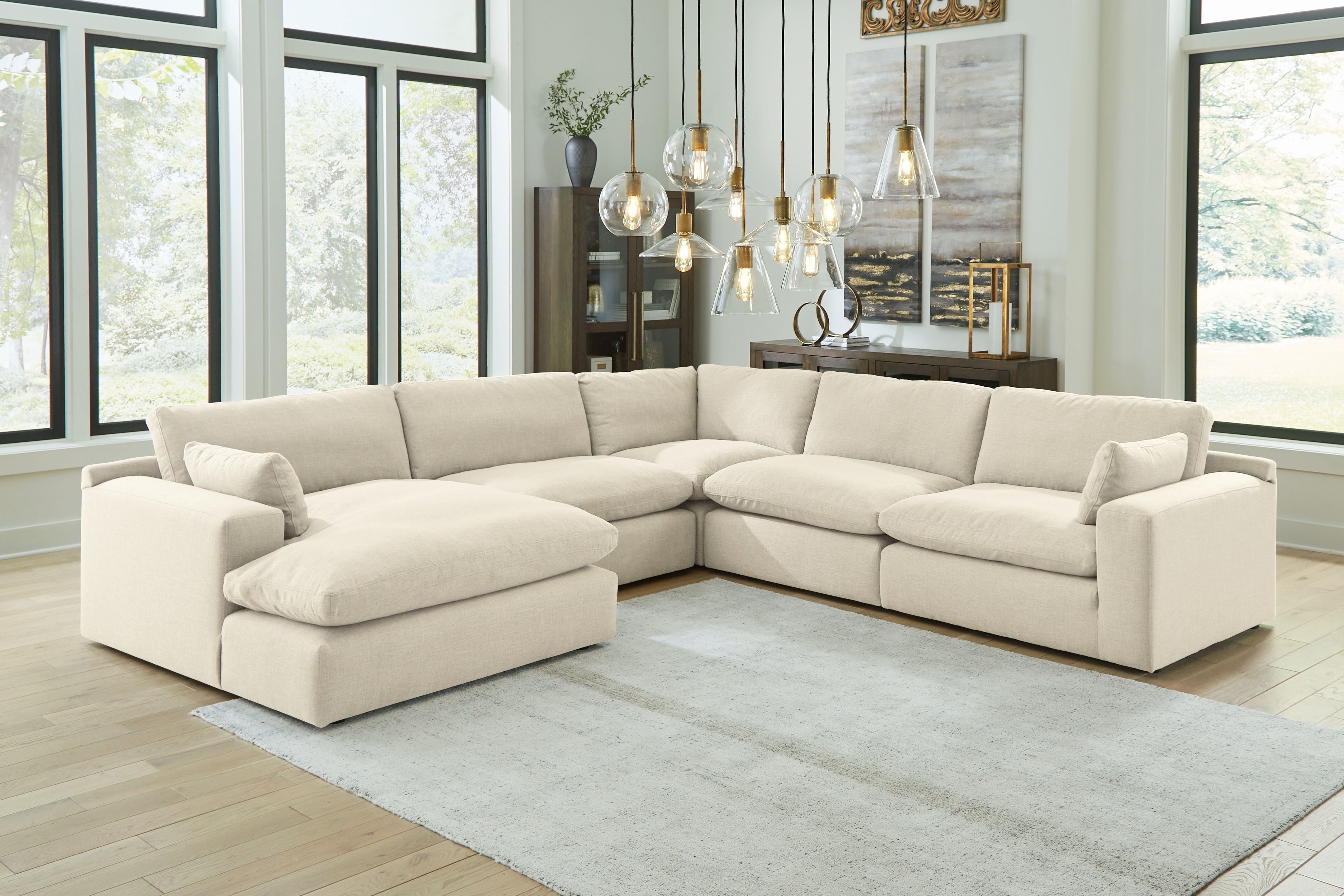 Beige linen sectional sofa with corner chaise, uniform cushions and tall back pillows
