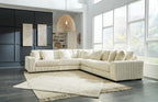 Ivory 5-piece sectional sofa with ribbed corduroy cushions and tufted back pillows