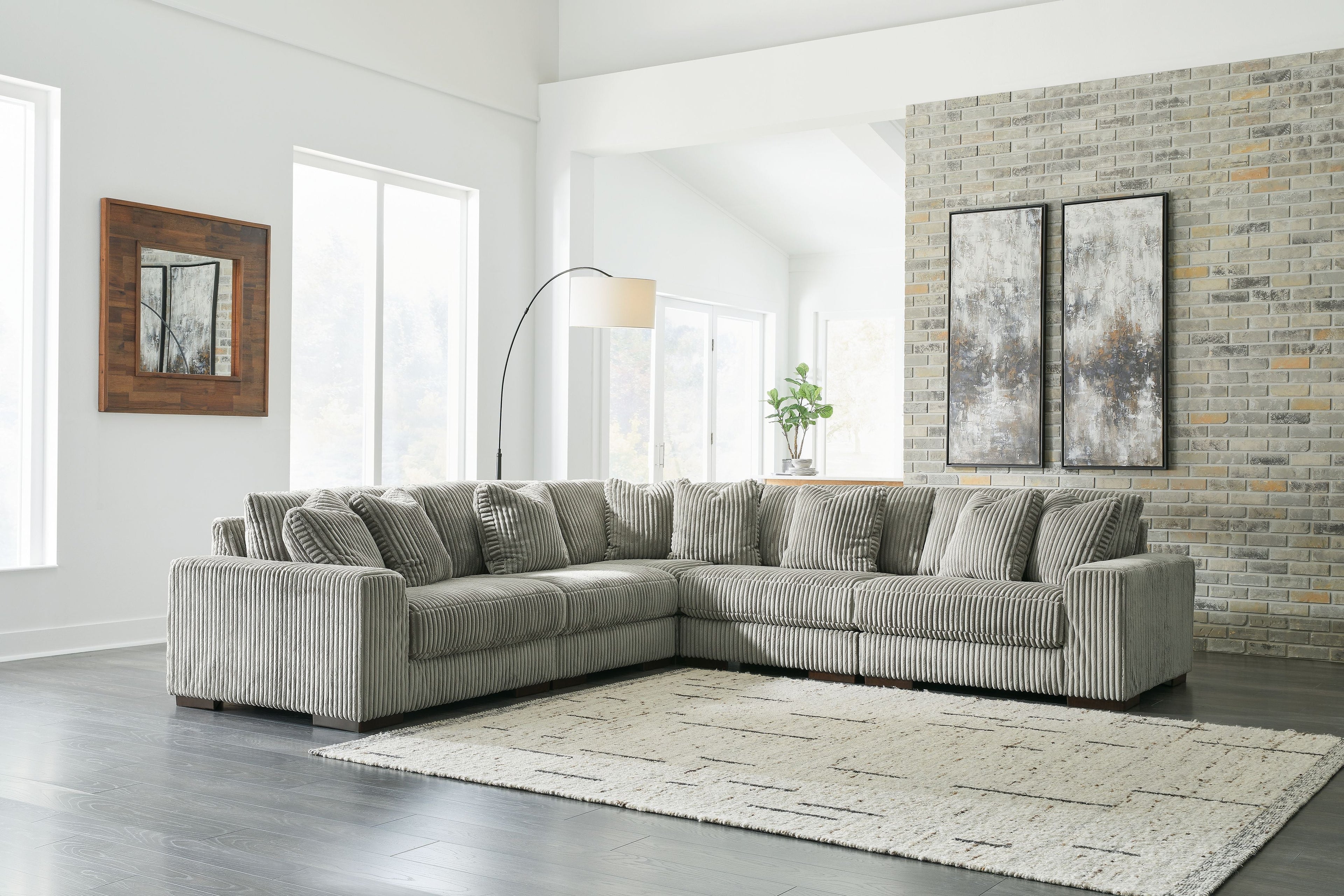 5-piece sectional sofa in dark gray ribbed corduroy with corner chaise and bolster pillows