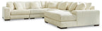 Sectional sofa with chaise, light ivory corduroy upholstery and deep seat cushions