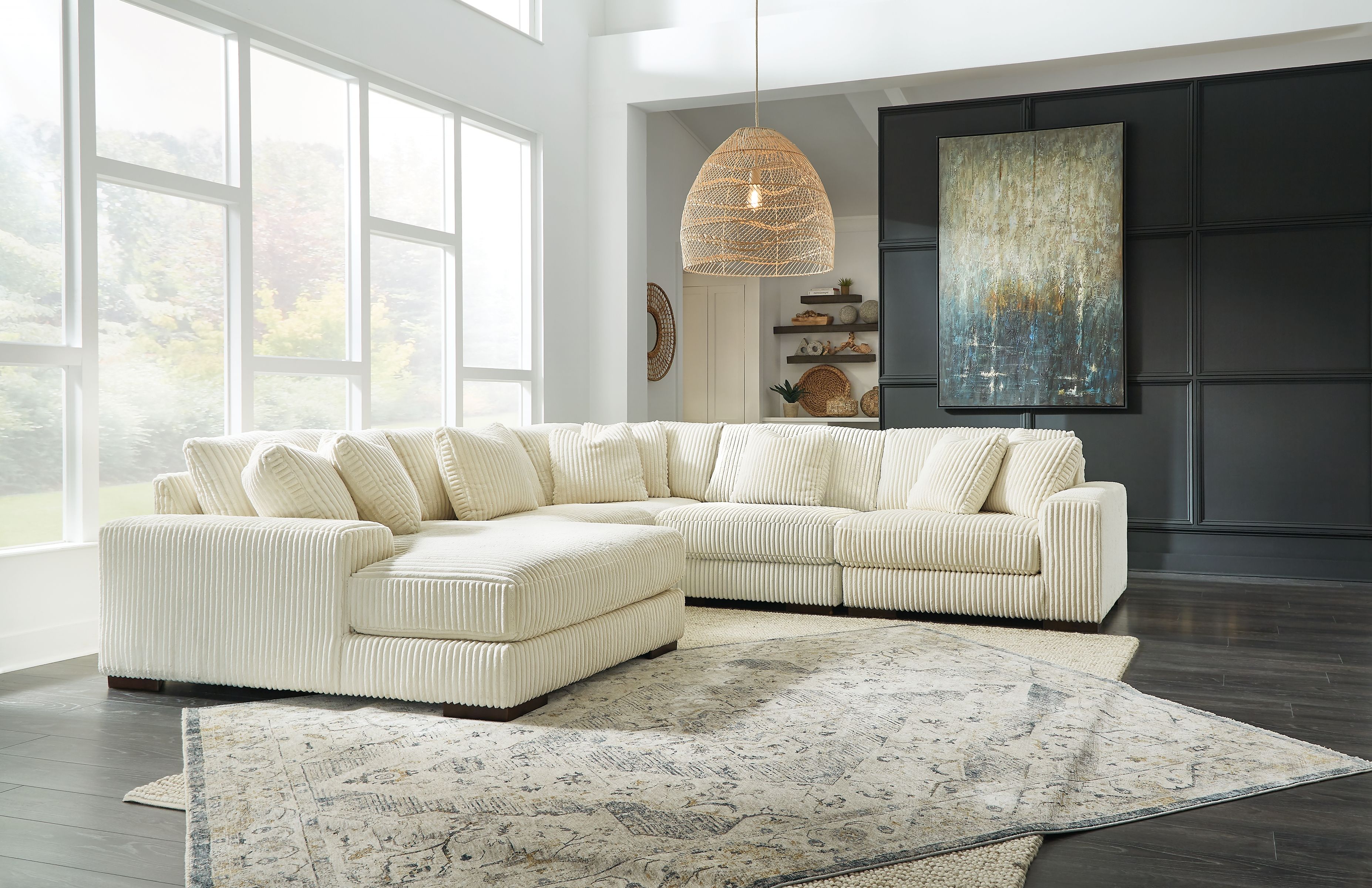 Sectional sofa with chaise, light ivory corduroy upholstery and tufted back cushions